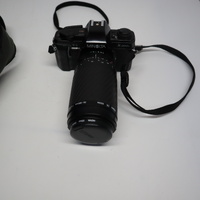 Minolta X-300s 35mm SLR Film Camera w/ Sigma DL Zoom 75-300mm Lens and Carry Bag Image 1