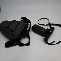 Minolta X-300s 35mm SLR Film Camera w/ Sigma DL Zoom 75-300mm Lens and Carry Bag